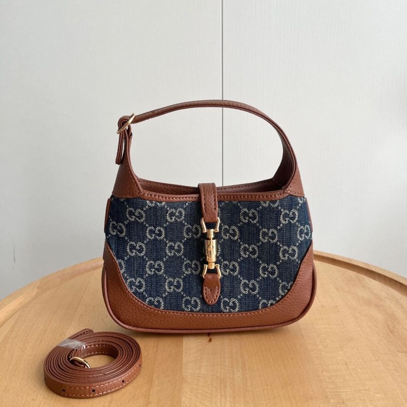 G*u*i top handle bags